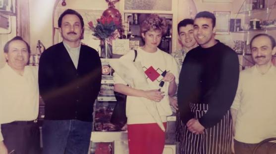 Photo of Princess Diana with shopkeepers.