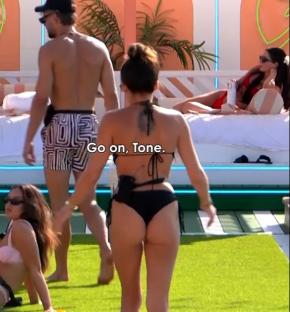 Love Island contestant Toni experiencing a wardrobe malfunction.