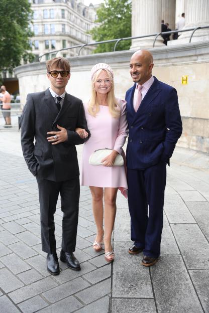 Emma Bunton, her partner Jade Jones, and their son arriving at a wedding.