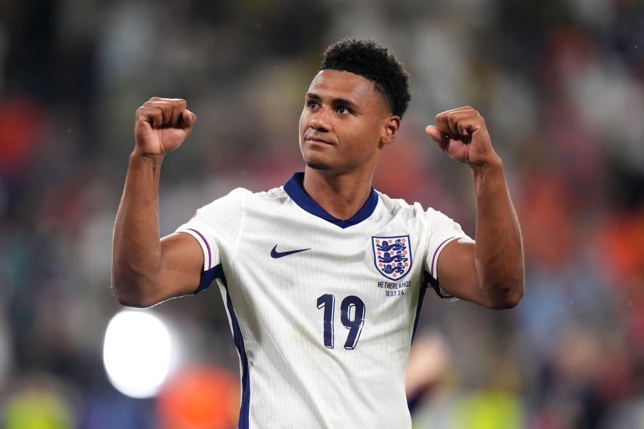 Ollie Watkins, Aston Villa striker, celebrating in an England jersey.
