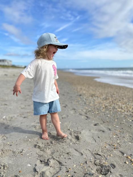 Toddler on beach.