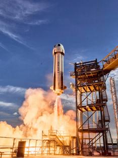 Blue Origin rocket launching.