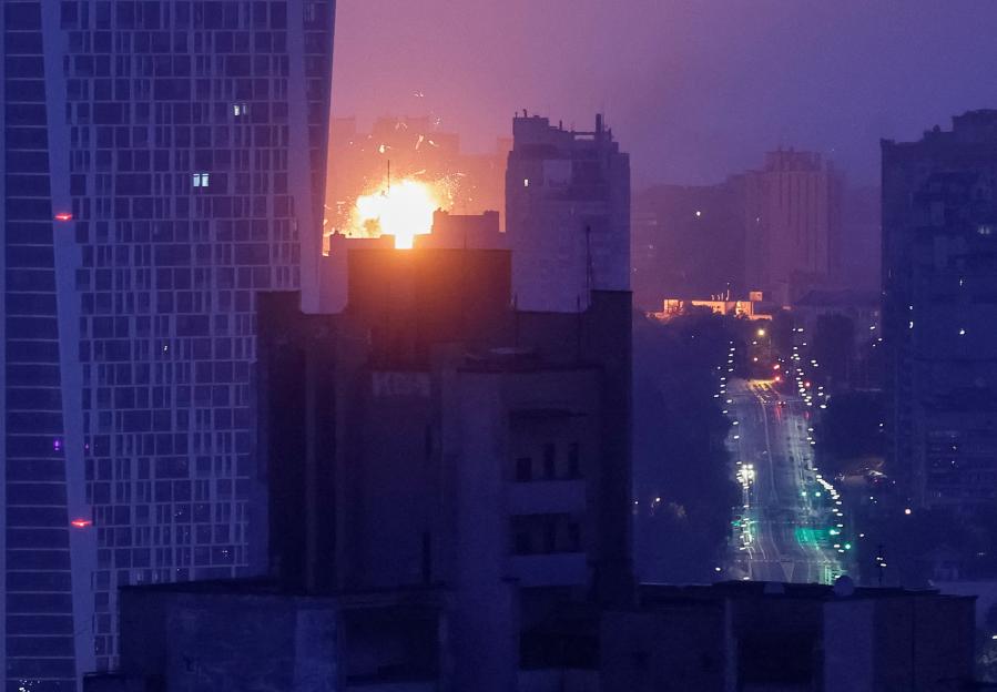 Drone explosion over Kyiv during a Russian attack.