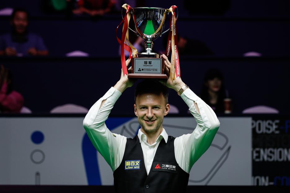 Judd Trump of England holding the Shanghai Masters trophy.