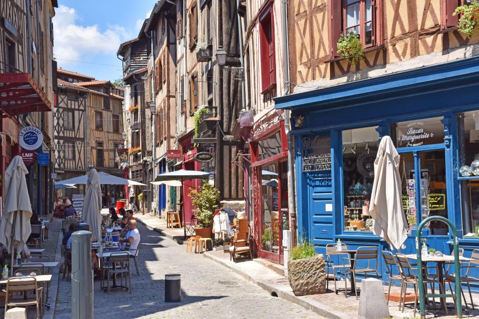 Restored medieval houses and restaurants in rue de la Boucherie, Limoges, France.