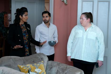 Scene from EastEnders showing Suki Panesar, Vinny Panesar, and Bernadette Taylor.