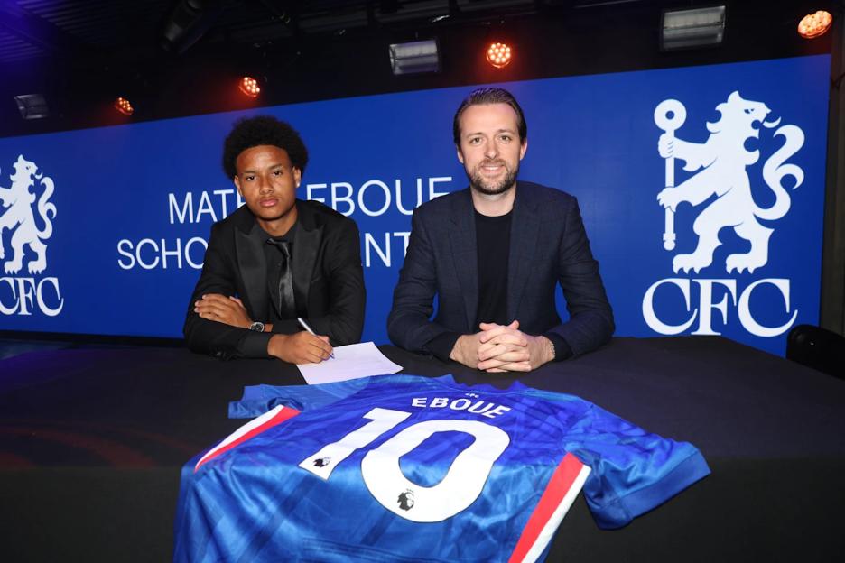 Mathis Eboue signing a Chelsea academy contract.