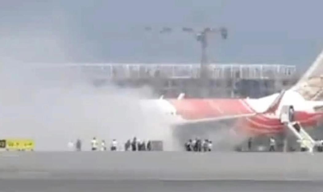 Air India flight catching fire after landing.