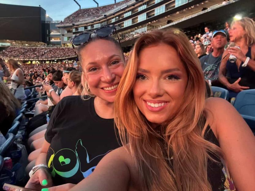 Two women at a Coldplay concert.