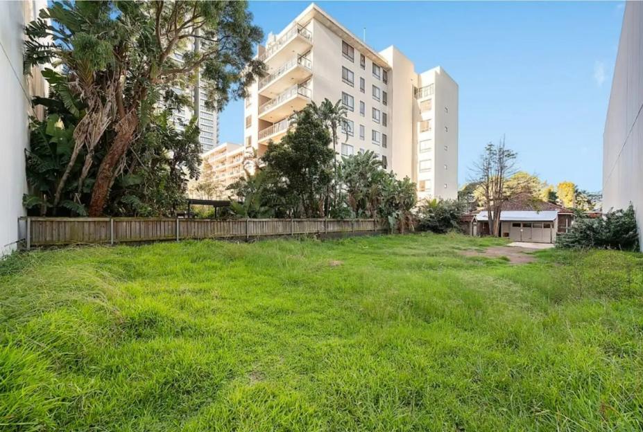 Residential and commercial zoned property with a large backyard.