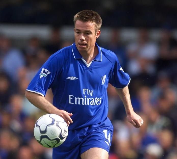 Graeme Le Saux in Chelsea uniform with soccer ball.