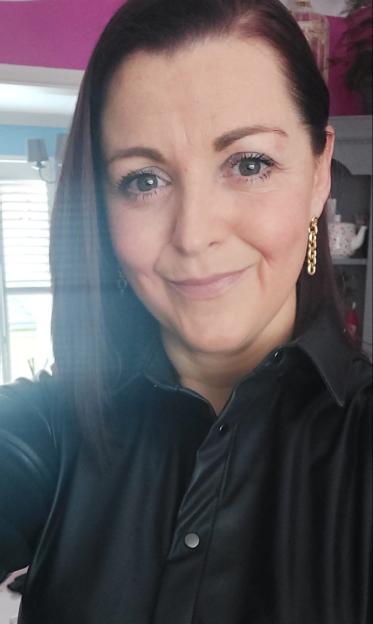 Woman in black shirt.