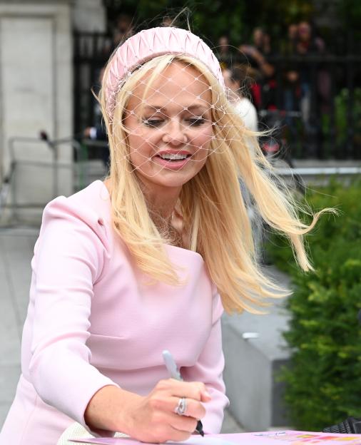 Mel B signing autographs outside St. Paul's Cathedral.