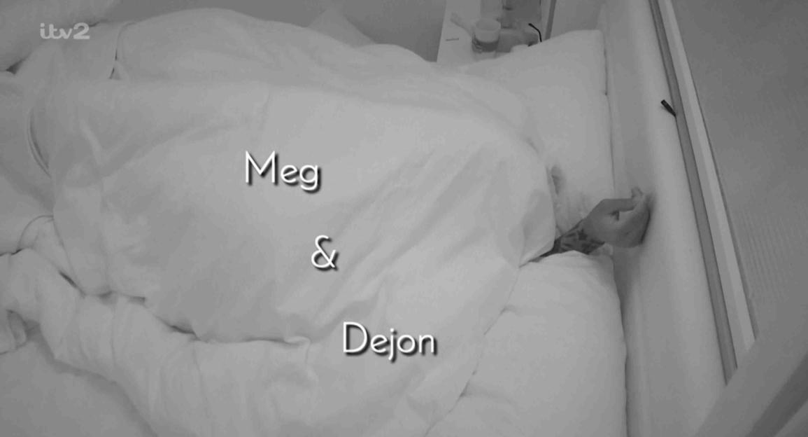 Meg and Dejon in bed.