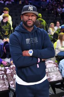 Floyd Mayweather Jr. at a basketball game.
