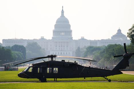 Sikorsky UH-60 Black Hawk helicopter in front of the U.S. Capitol.