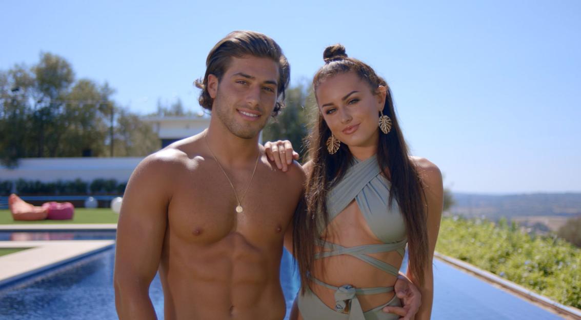 Kem Cetinay and Amber Davies from Love Island, Series 3.