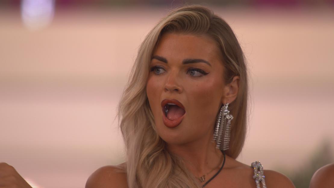 Helena from Love Island with surprised expression.