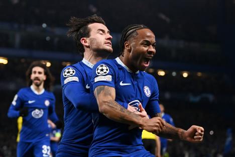 Raheem Sterling and Ben Chilwell of Chelsea celebrating a goal.