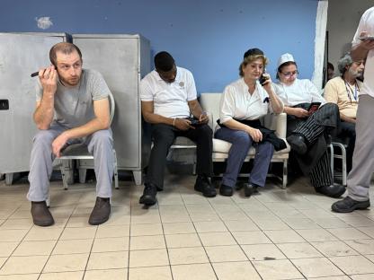 People sheltering in a hotel bunker.