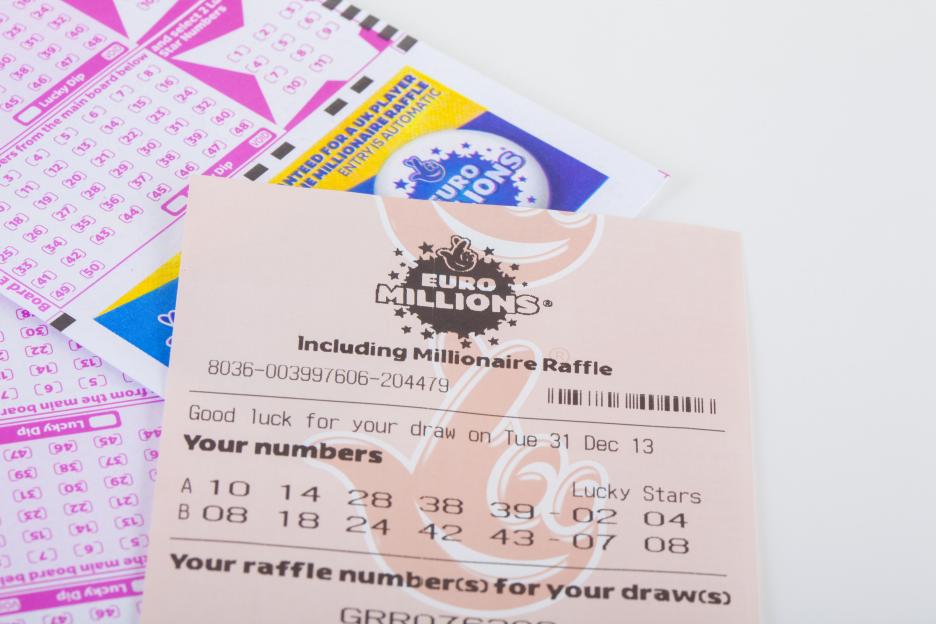EuroMillions lottery ticket with numbers and raffle code.