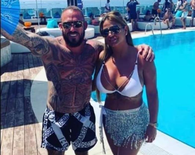Thomas Campbell and Coleen Campbell by a pool.