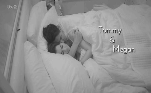 Black and white photo of Tommy and Megan sleeping in bed.