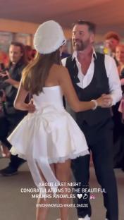 Nick Knowles and his wife dancing at their wedding reception.