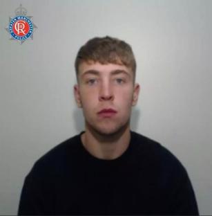Mugshot of a young man.