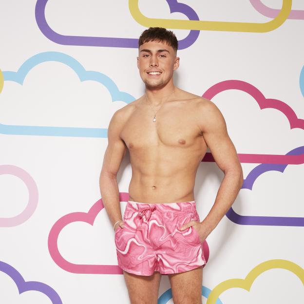 Frankie Davey, Love Island Casa Amor star, holding up sunglasses.