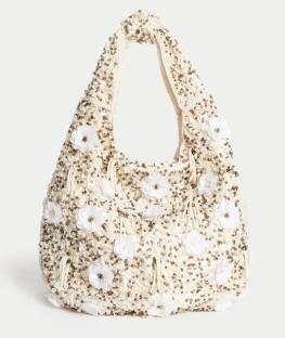 Beaded handbag with floral embellishments.