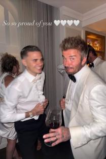 David Beckham and his son Romeo Beckham at an event.