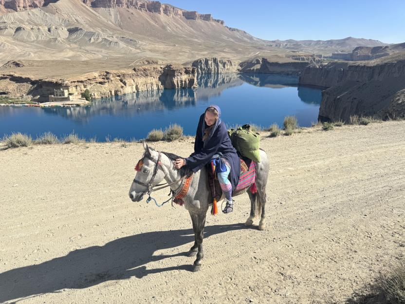 Woman on horseback in Afghanistan.