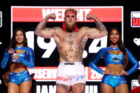 Jake Paul flexing at a weigh-in.