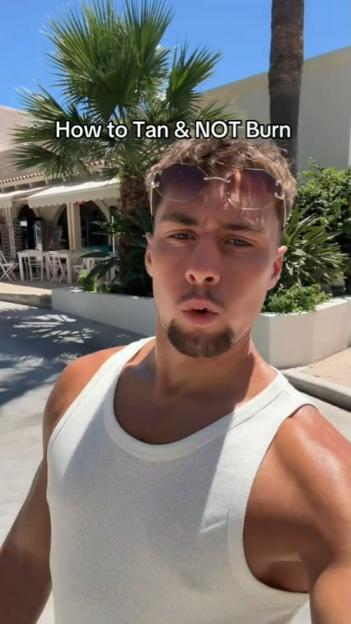 Frankie Davey in a white tank top, giving sun safety advice.