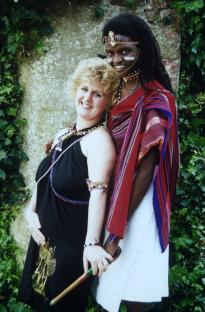 Cheryl Mason and Daniel Lekimenju in traditional clothing.
