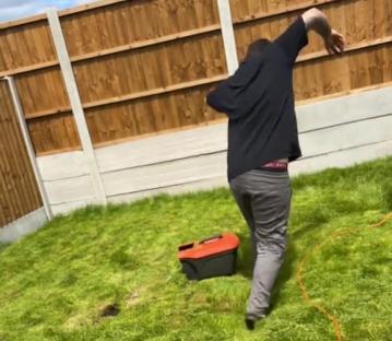 Person sinking into a soggy lawn in a new build home.