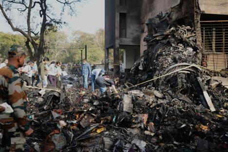 Rescuers at the site of a plane crash.