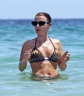 Coleen Rooney in a bikini in the ocean.