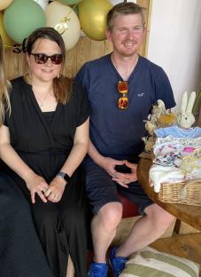 A woman and man at a baby shower.
