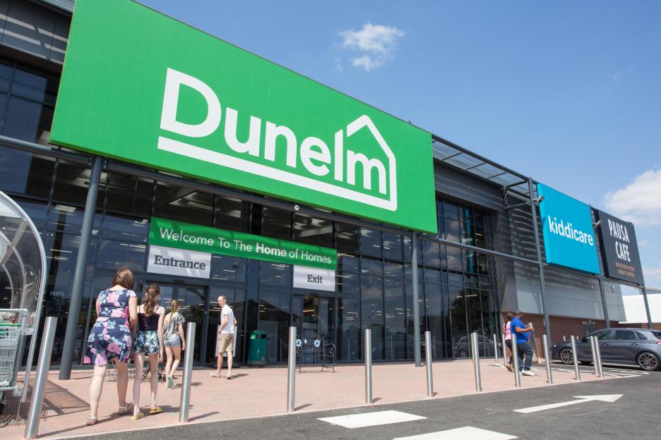 Dunelm store entrance with shoppers.