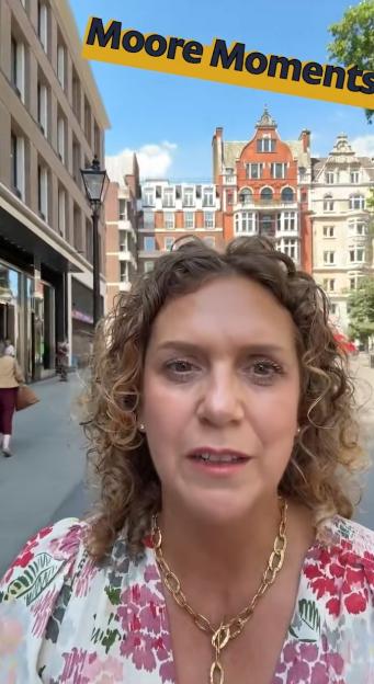 Hannah Ingram Moore in a London street, talking to the camera.