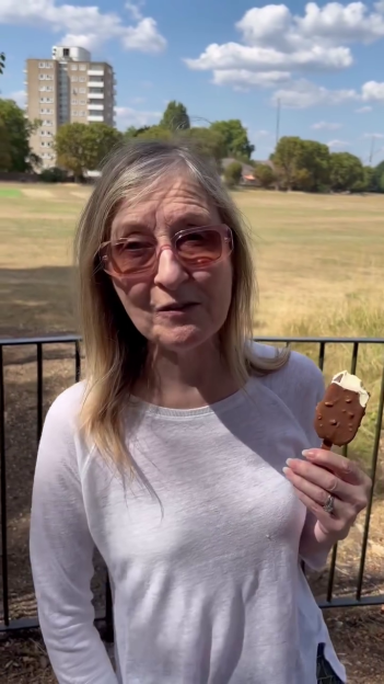 Fiona Phillips holding an ice cream bar.