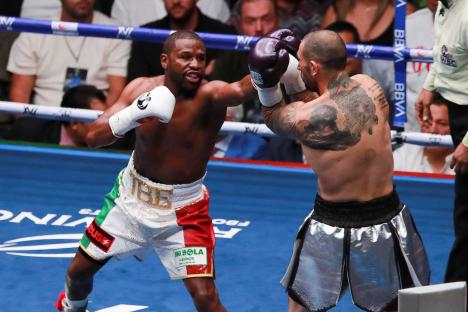 Floyd Mayweather Jr. and John Gotti III boxing.