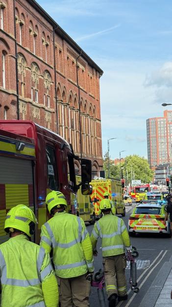 Emergency responders at the scene of a car crash in Leeds.