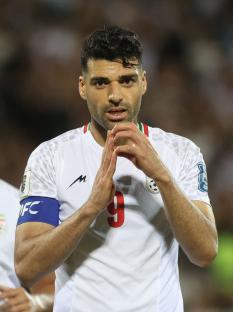 Mehdi Taremi of Iran celebrating a goal.