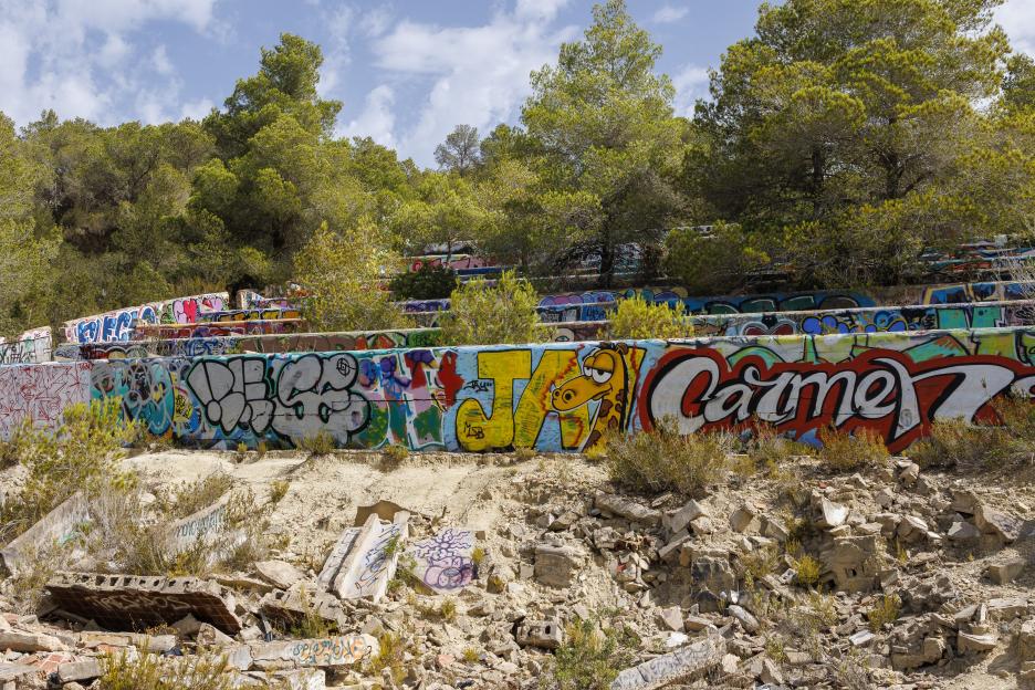 Graffiti-covered ruins of a former Ibiza nightclub.