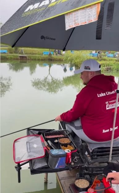 Luke Littler fishing in a competition.