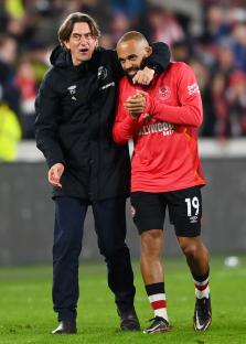 Brentford manager Thomas Frank and player Bryan Mbeumo celebrating a victory.