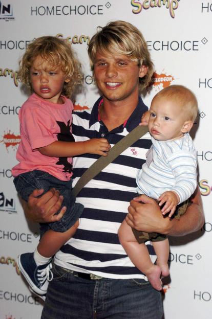 Jeff Brazier with his two sons at an event.